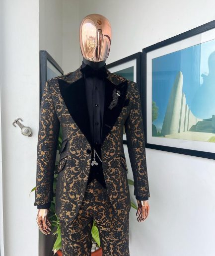 A Gold and black mandarin metallic floral jacquard, peak lapel tuxedo suit.