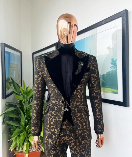 A Gold and black mandarin metallic floral jacquard, peak lapel tuxedo suit.