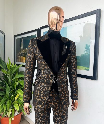 A Gold and black mandarin metallic floral jacquard, peak lapel tuxedo suit.