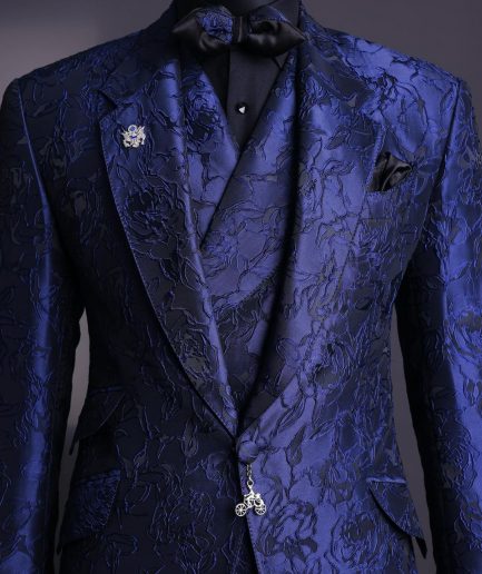 A Navy blue, knitted, root floral jacquard notch lapel suit.