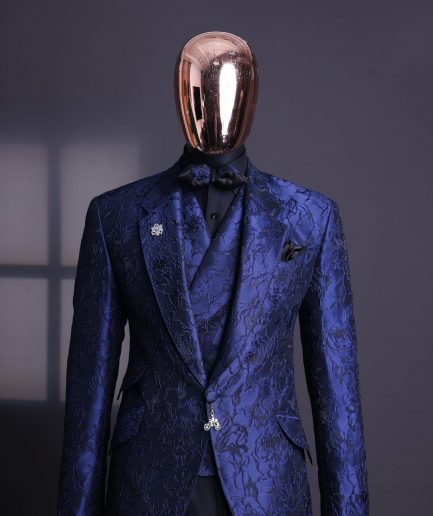 A Navy blue, knitted, root floral jacquard notch lapel suit.