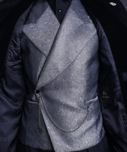 A Silver and black, knitted, jacquard peak lapel tuxedo suit