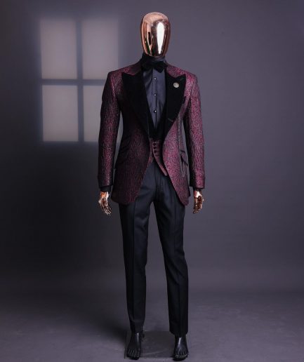 A burgundy, black broom splashed metallic jacquard, knitted, peak lapel tuxedo suit