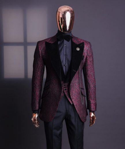 A burgundy, black broom splashed metallic jacquard, knitted, peak lapel tuxedo suit