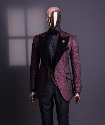 A burgundy, black broom splashed metallic jacquard, knitted, peak lapel tuxedo suit