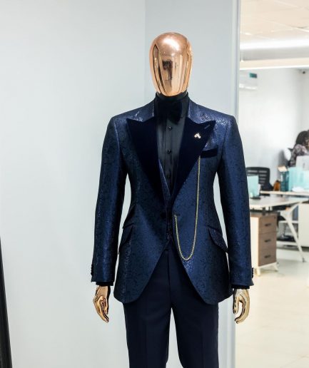 A Navy blue, floral pattern jacquard, peak lapel tuxedo suit