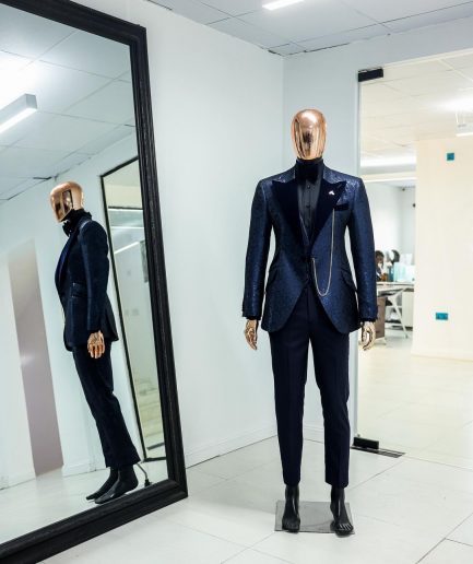 A Navy blue, floral pattern jacquard, peak lapel tuxedo suit