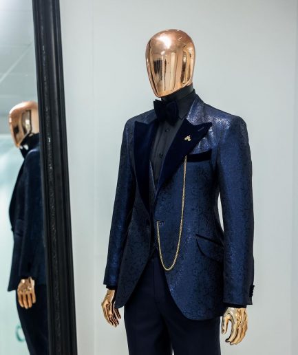 A Navy blue, floral pattern jacquard, peak lapel tuxedo suit