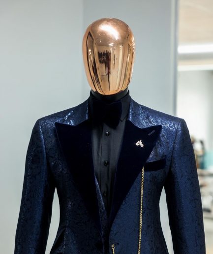 A Navy blue, floral pattern jacquard, peak lapel tuxedo suit