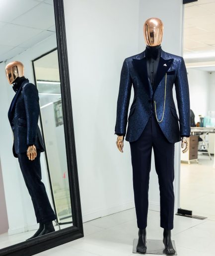 A Navy blue, floral pattern jacquard, peak lapel tuxedo suit