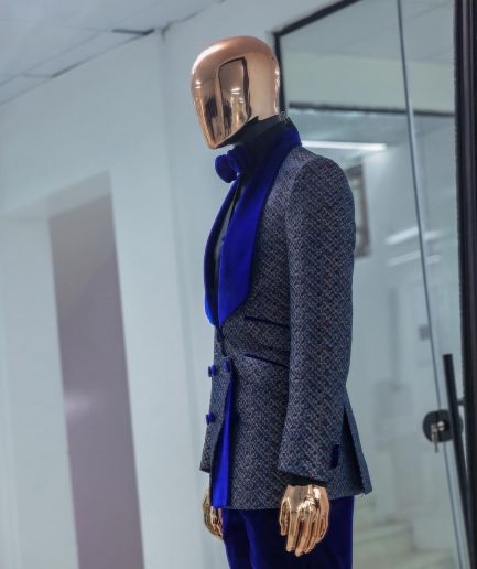 A Reloaded “pirate”, spotted navy blue and orange metallic jacquard, shawl lapel tuxedo suit