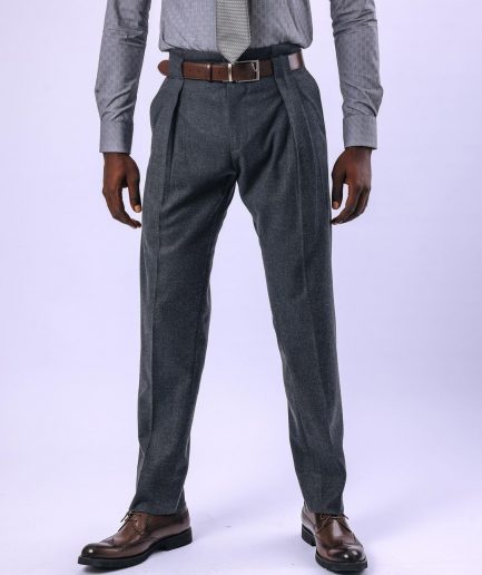 A Grey Gurkha pant with a covered belt tab and double pleats.