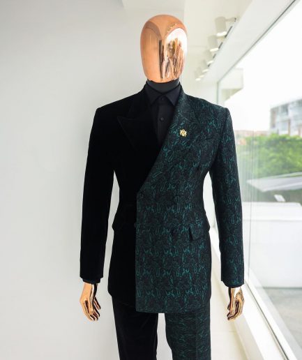 An Emerald green & black “rival” 1/4 cut ocean element peak lapel double breasted jacquard suit