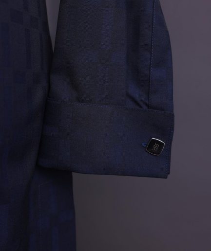A Midnight blue, broken rectangle and square pattern, jorgecarli, front flap with black Swarovski button, long sleeve African senator kaftan native.