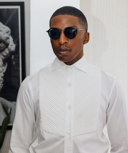 A White, Cut-Away Pleated Evening Tuxedo Shirt.