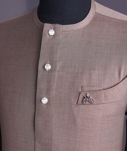 A Light brown, jorgecarli fabric, front flap with silver Swarovski button, long sleeve African senator kaftan native.