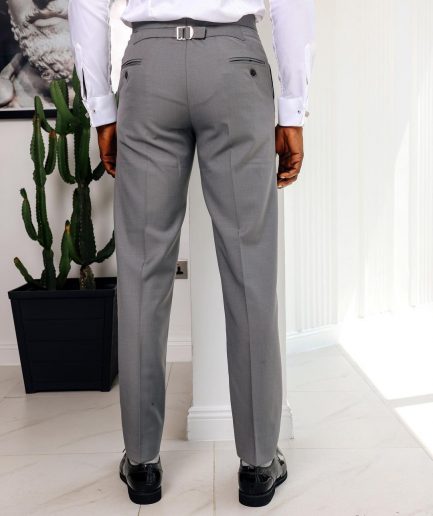 A light grey, Gurkha pant with back and side metal adjuster.