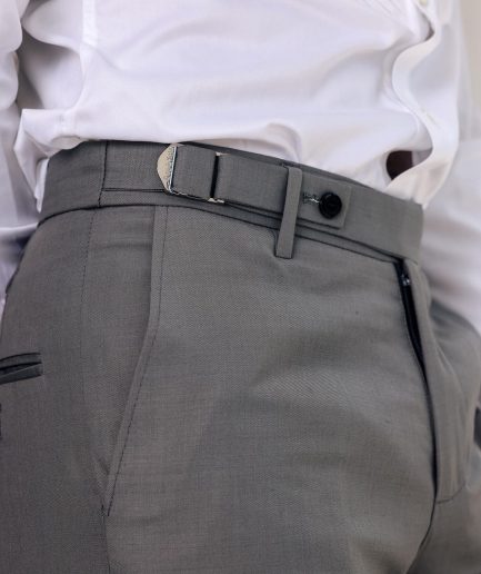 A light grey, Gurkha pant with back and side metal adjuster.