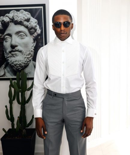 A White, Cut-Away Pleated Evening Tuxedo Shirt.