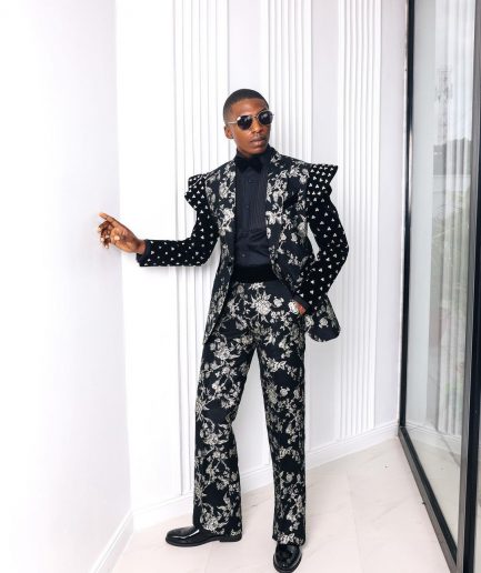 A “Vegas 2”, Floral pattern jacquard, Elevated shoulder and sleeve with Swarovski details peak Lapel tux suit