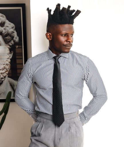 A White and blue stripe, cut-away collar business shirt.