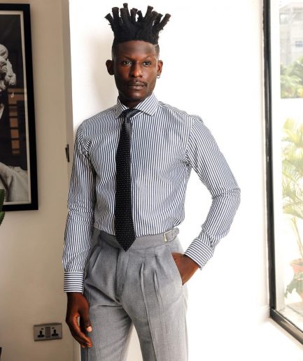 A White and blue stripe, cut-away collar business shirt.