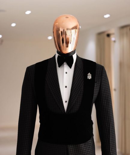 A Charcoal Black, stuffed/slanted Square Patterned jacquard peak lapel tuxedo suit