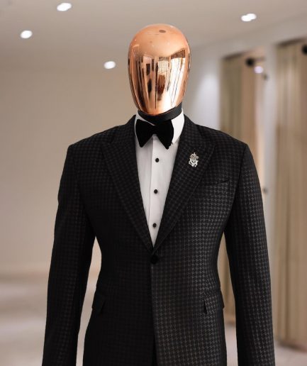 A Charcoal Black, stuffed/slanted Square Patterned jacquard peak lapel tuxedo suit