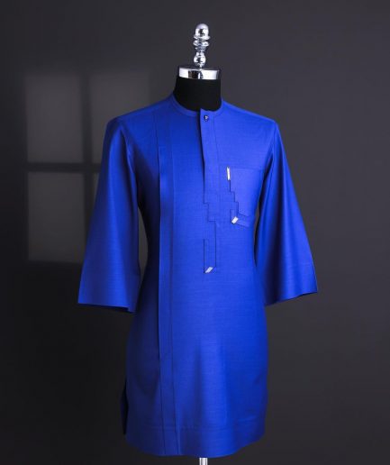 An Egyptian blue, dipped rectangle flap, pocket, 3/4 sleeve traditional african senator kaftan native.