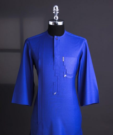 An Egyptian blue, dipped rectangle flap, pocket, 3/4 sleeve traditional african senator kaftan native.