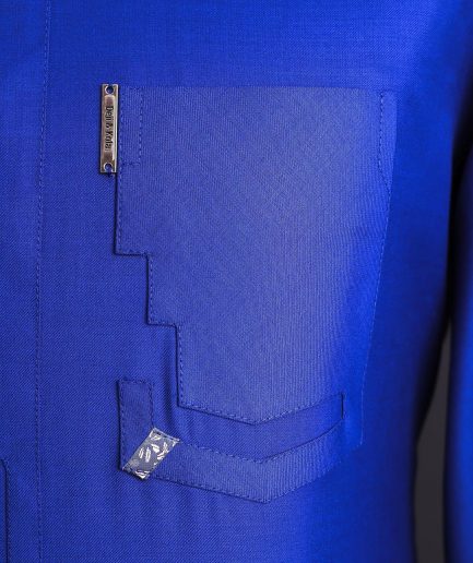 An Egyptian blue, dipped rectangle flap, pocket, 3/4 sleeve traditional african senator kaftan native.