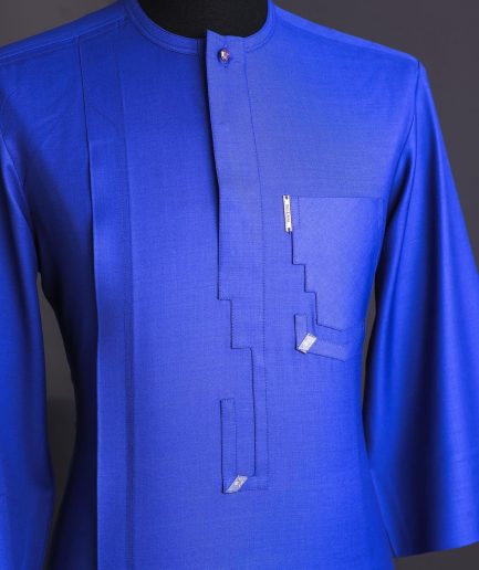 An Egyptian blue, dipped rectangle flap, pocket, 3/4 sleeve traditional african senator kaftan native.