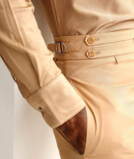 A Light brown Gurkha Pant With A Side Metal Adjuster.
