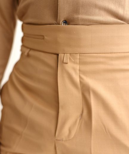 A Light brown Gurkha Pant With A Side Metal Adjuster.