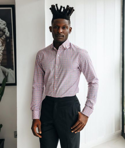 An Orange, blue & white plaid check with a high collar with a turn-up casual shirt.