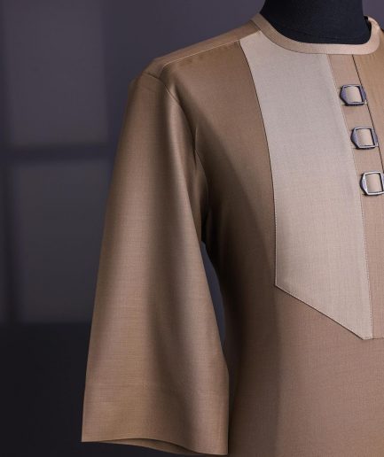 A Tortilla brown, invisible zip, black connected metal tag, 3/4 sleeve traditional african senator kaftan native.