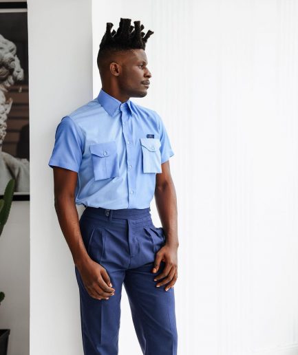A Herringbone mix shade of blue English spread collar short sleeve casual shirt with double patch pocket.