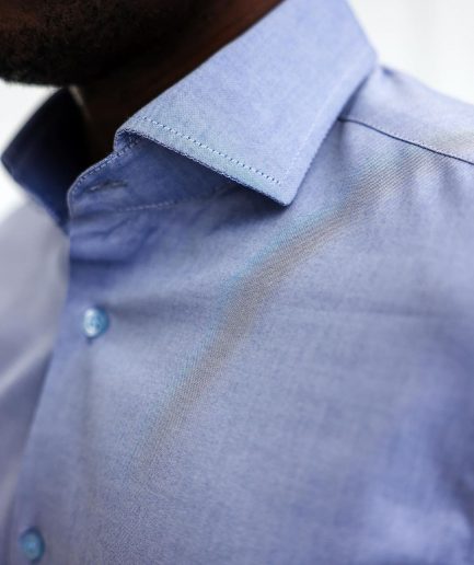 A Blue Oxford Business Shirt.