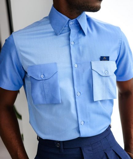 A Herringbone mix shade of blue English spread collar short sleeve casual shirt with double patch pocket.