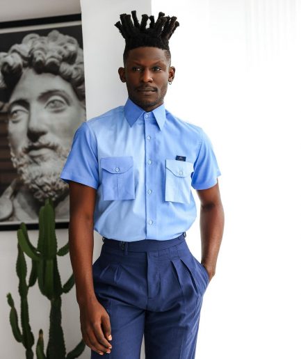 A Herringbone mix shade of blue English spread collar short sleeve casual shirt with double patch pocket.
