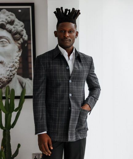 A Charcoal grey, windowpane check, nobility fabric cover coat with patch pocket detailing