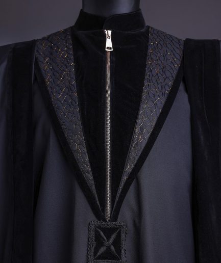 A Charcoal Black, Vehicular Lapelled with Zip Line Flap & Velvet Mix Embroidery Design Details Agbada.