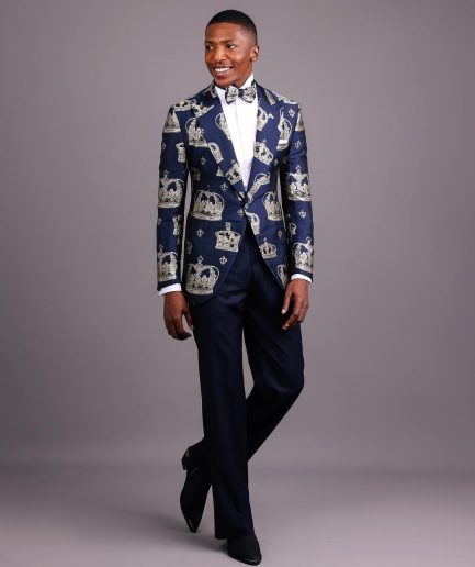 A Navy Blue Peak Lapel, Dispersed Crown Metallic Jacquard Tuxedo Suit And Wide Cut Pant Trouser.