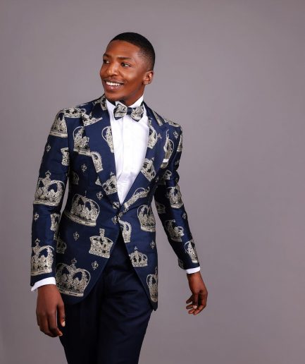 A Navy Blue Peak Lapel, Dispersed Crown Metallic Jacquard Tuxedo Suit And Wide Cut Pant Trouser.