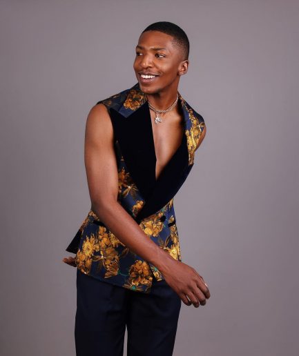 A “Boomerang” Sleeveless, Adjusted Peak Lapel Floral Jacquard Tuxedo Suit & Wide Cut Pant Trouser.