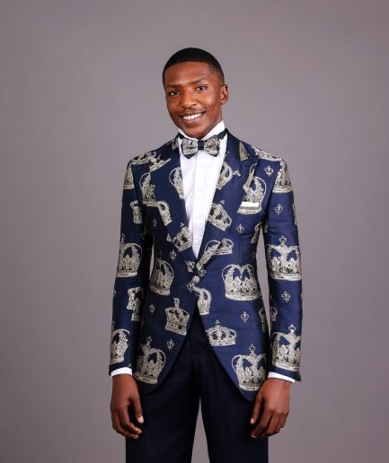 A Navy Blue Peak Lapel, Dispersed Crown Metallic Jacquard Tuxedo Suit And Wide Cut Pant Trouser.