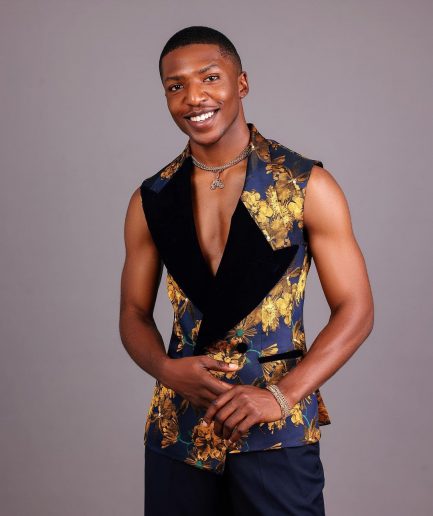 A “Boomerang” Sleeveless, Adjusted Peak Lapel Floral Jacquard Tuxedo Suit & Wide Cut Pant Trouser.