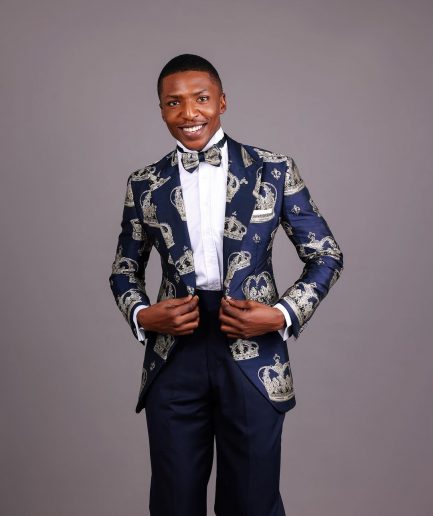 A Navy Blue Peak Lapel, Dispersed Crown Metallic Jacquard Tuxedo Suit And Wide Cut Pant Trouser.