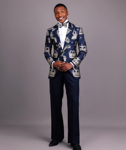 A Navy Blue Peak Lapel, Dispersed Crown Metallic Jacquard Tuxedo Suit And Wide Cut Pant Trouser.