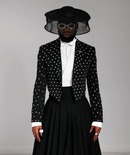 The ''Prince” Charcoal Black Short Peak Lapel Suit With ss30 Swarovski Stones, Double-breasted Waistcoat, High Pant Trousers & Pleated Long Tail Skirt.